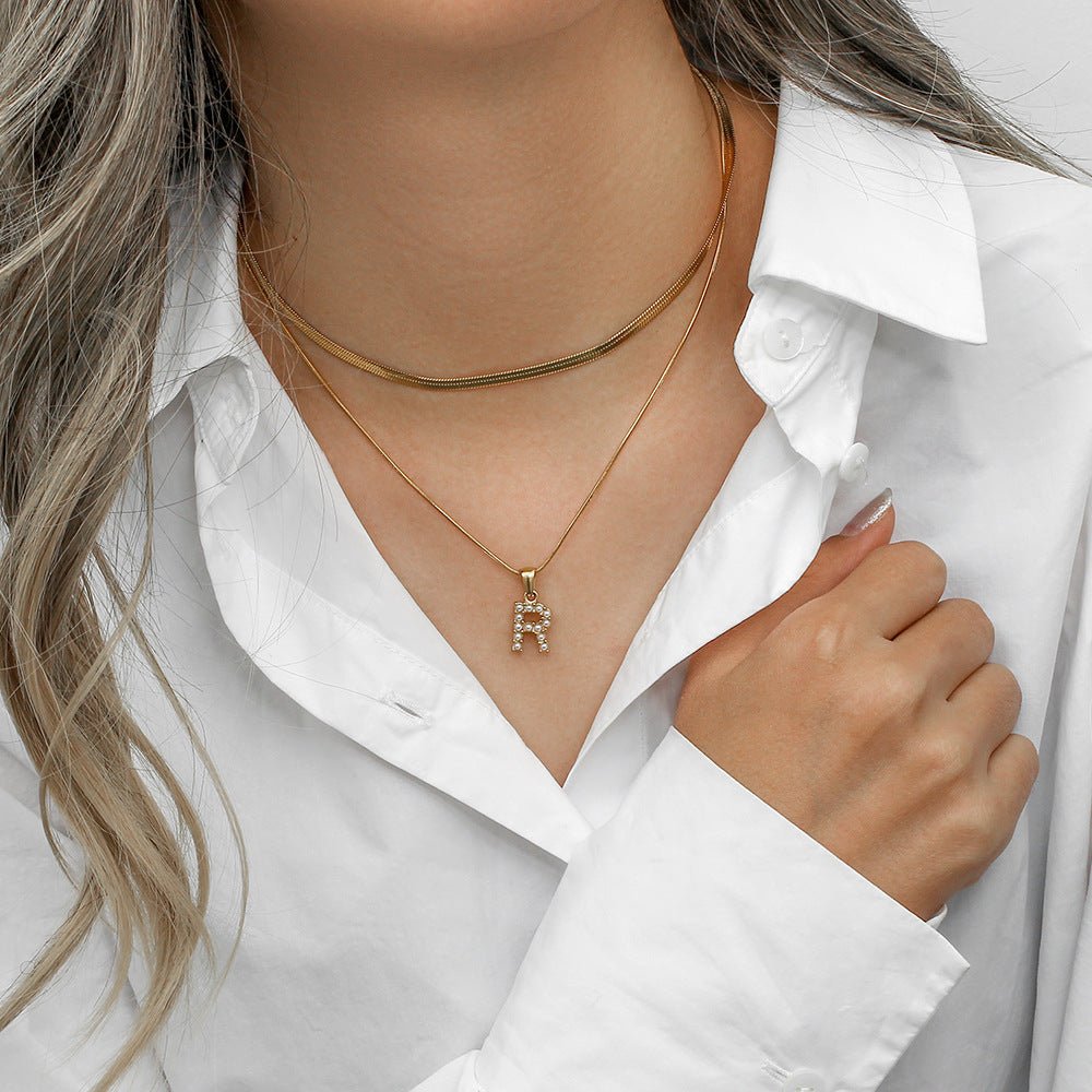 Gold Necklace with Overlapping Initial Letter Fiona