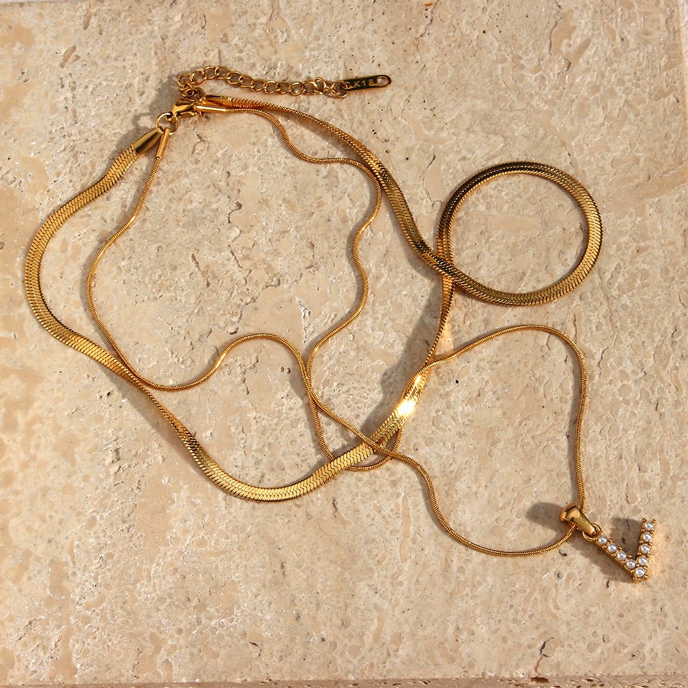 Gold Necklace with Overlapping Initial Letter Fiona